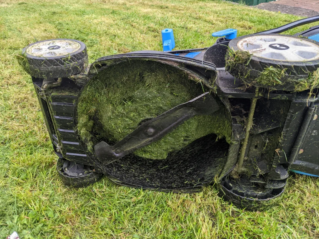 Rotary, mower, tipped, over, on, side, for, cleaning.jpeg